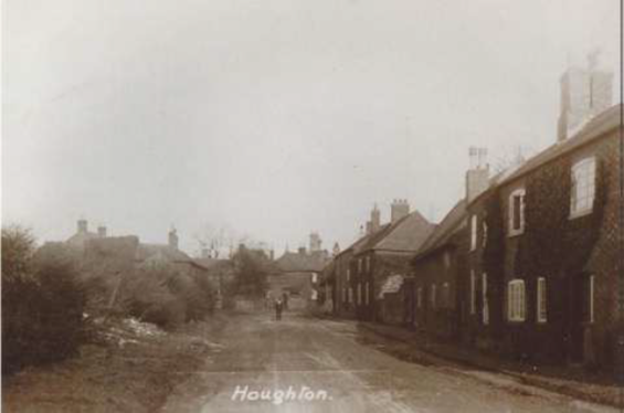 Main St. 1920—note the removal of the hedge to start construction of the village hall